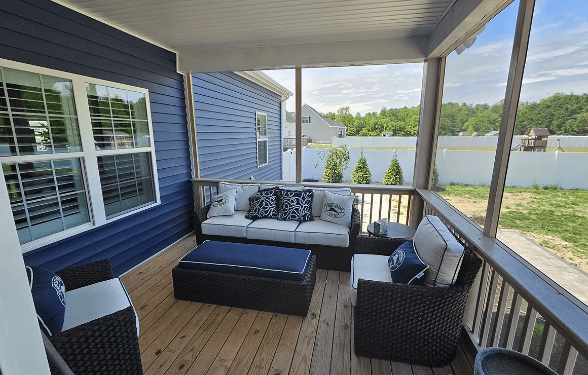 Cozy outdoor seating area on deck